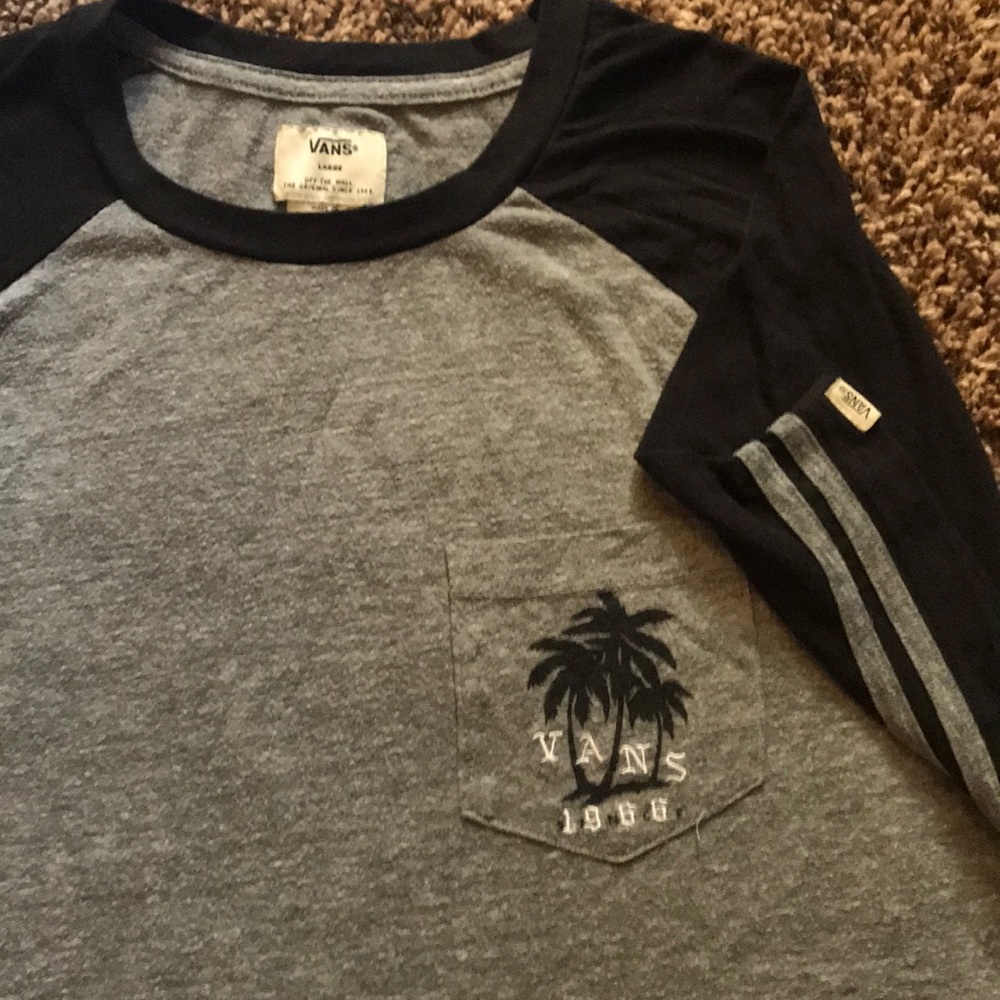 And men’s large gray and black T-shirt